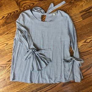 Grey and white striped blouse